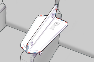 Illustration for article titled Este invento puede acabar con la guerra del reposabrazos en el avión